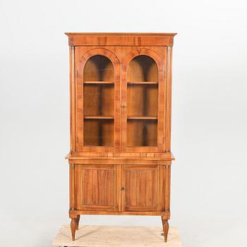 A Louis XVI style walnut display cabinet.
