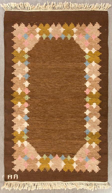 A signed Swedish flatweave carpet ca 207 x 137 cm.