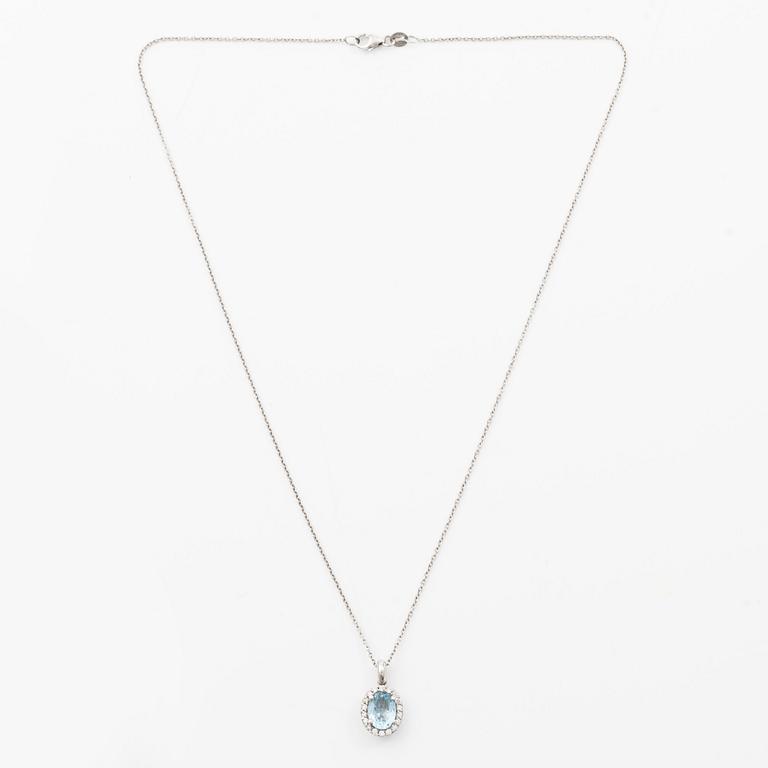Pendant with chain in 18K white gold set with a faceted aquamarine and round brilliant-cut diamonds.