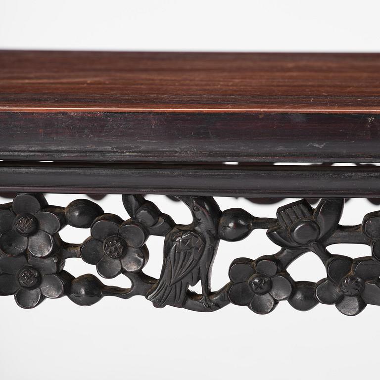 A Chinese hardwood kang table, late Qing dynasty.