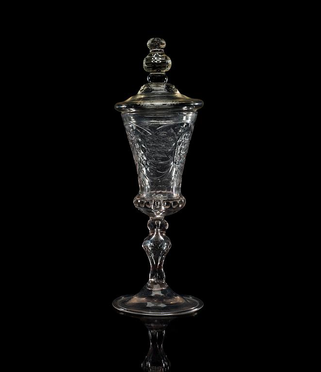 A German cut glass wine goblet with cover, 18th Century.