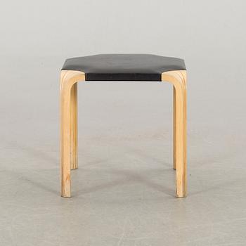 AN ALVAR AALTO "X602" STOOL by Artek.