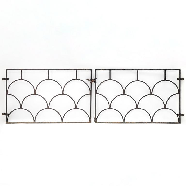 A pair of cast iron gates, 1930's.