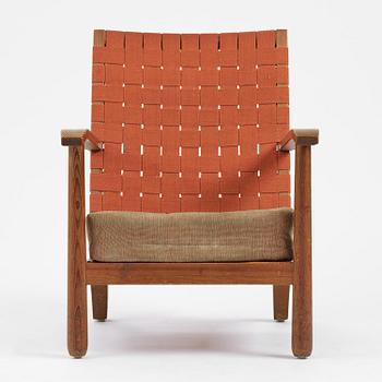 Axel Einar Hjorth, a stained pine "Väddö" easy chair, Nordiska Kompaniet, Sweden, 1930s-40s.