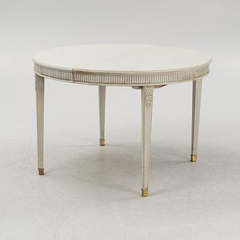 A Gustavian style dining table, mid 20th century.