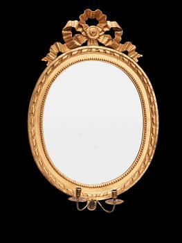 A Gustavian late 18th century two-light girandole mirror.