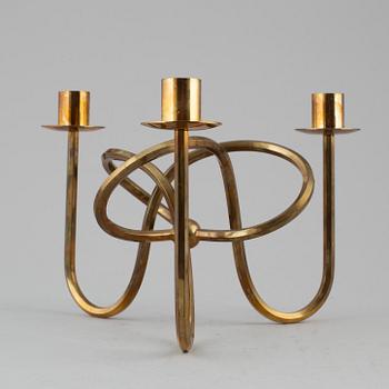 JOSEF FRANK, a brass candelabra, Firma Svenskt Tenn.