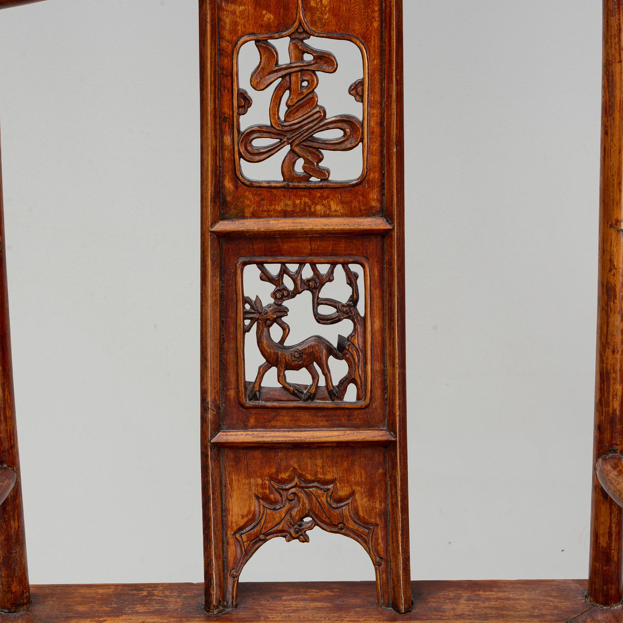 A pair of chinese armchairs, 20th century.