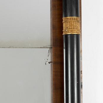 An Empire Mahogany Veneer Mirror and Console Table, first half of the 19th Century.