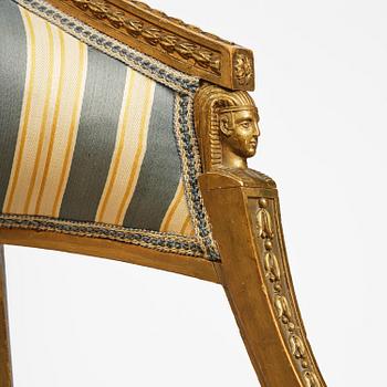 A pair of late Gustavian open armchairs attributed to E. Ståhl (master in Stockholm 1794-1820).