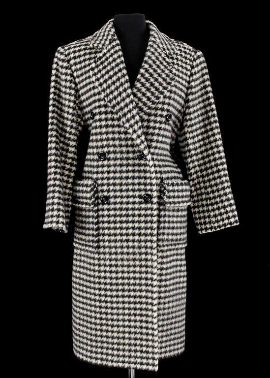 A 1984s coat by Yves Saint Laurent.