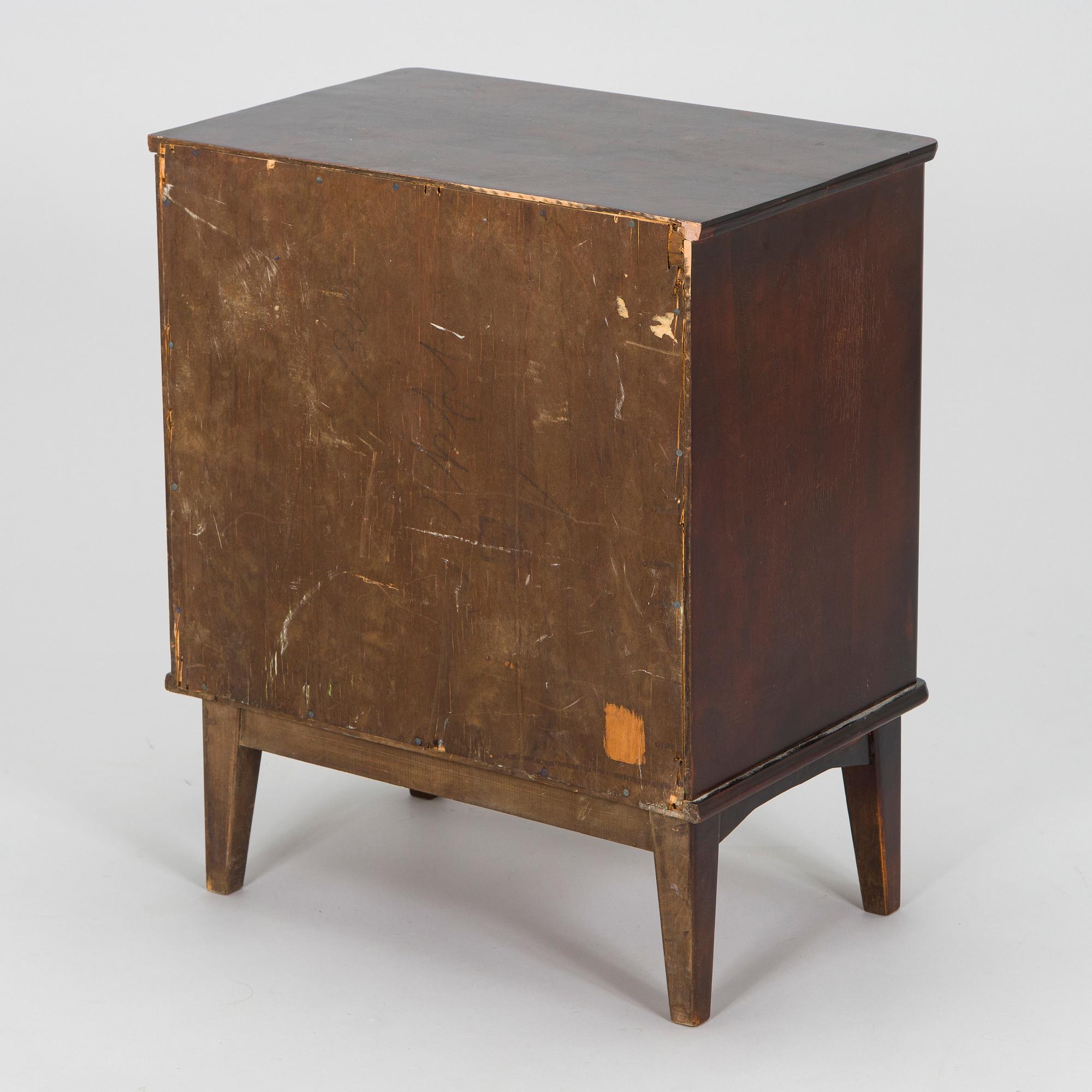 A 1930s functionalist style chest of drawer.