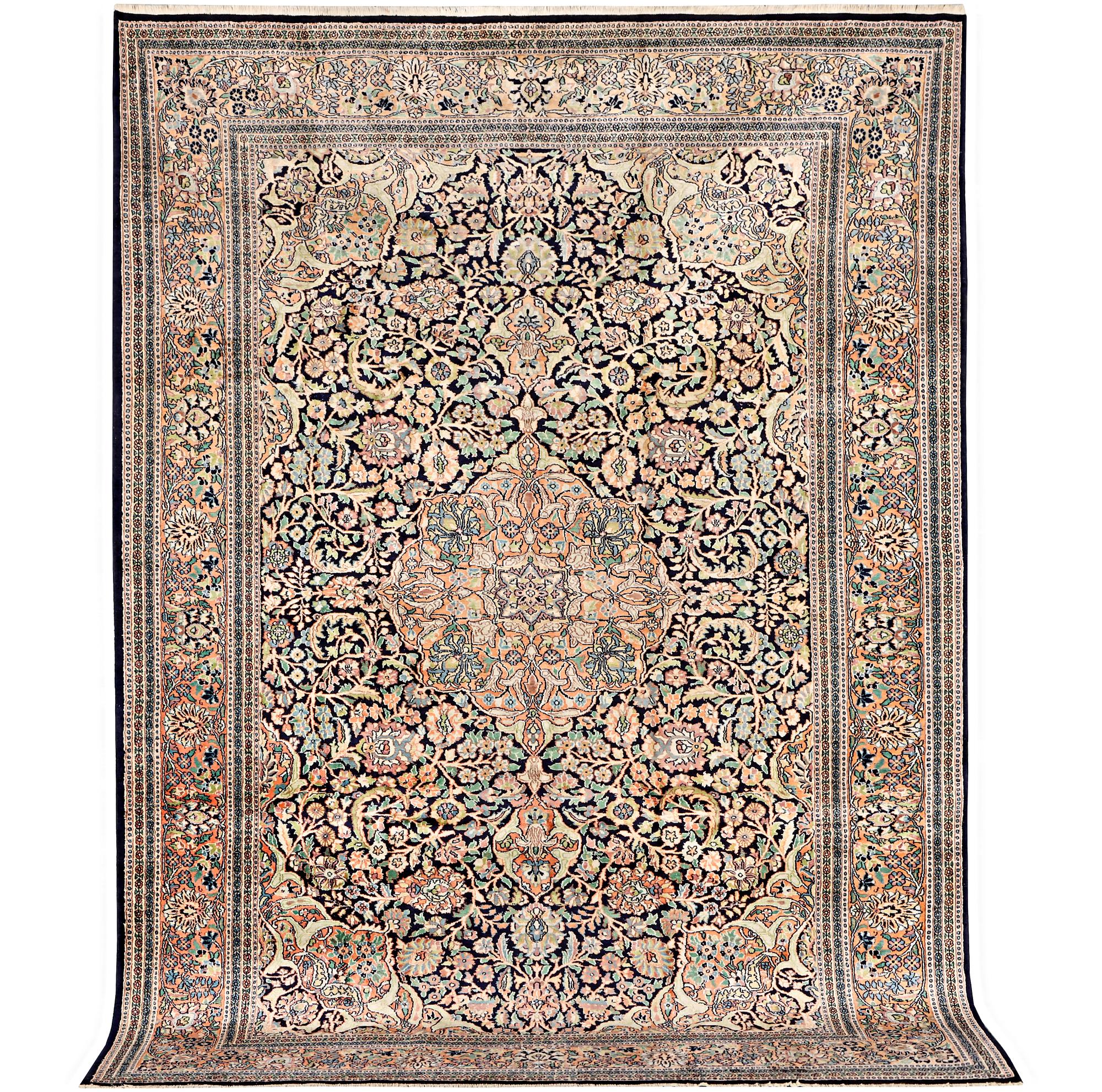 A Kashmir carpet, silk, c. 333 x 234 cm.