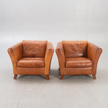 A pair of Lederland leather armchairs Netherlands later part of the 20th century.