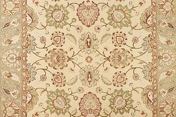 An oriental carpet with Mamluk design, c. 294 x 250 cm.