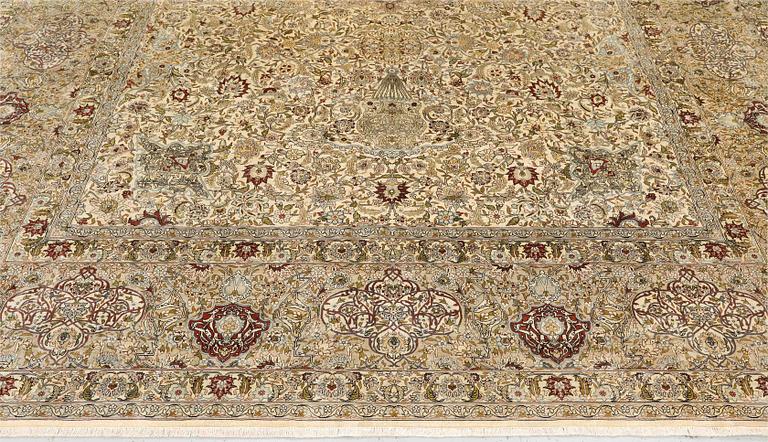 A oriental silk carpet, 350 x 247 cm.