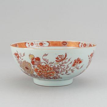 A rouge de fer bowl and three dishes, Qing dynasty, Qianlong (1736-95).