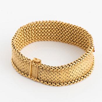 Armband 18K guld med runda briljantslipade diamanter och rubiner.