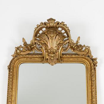 A mirror with console table, late 19th century.