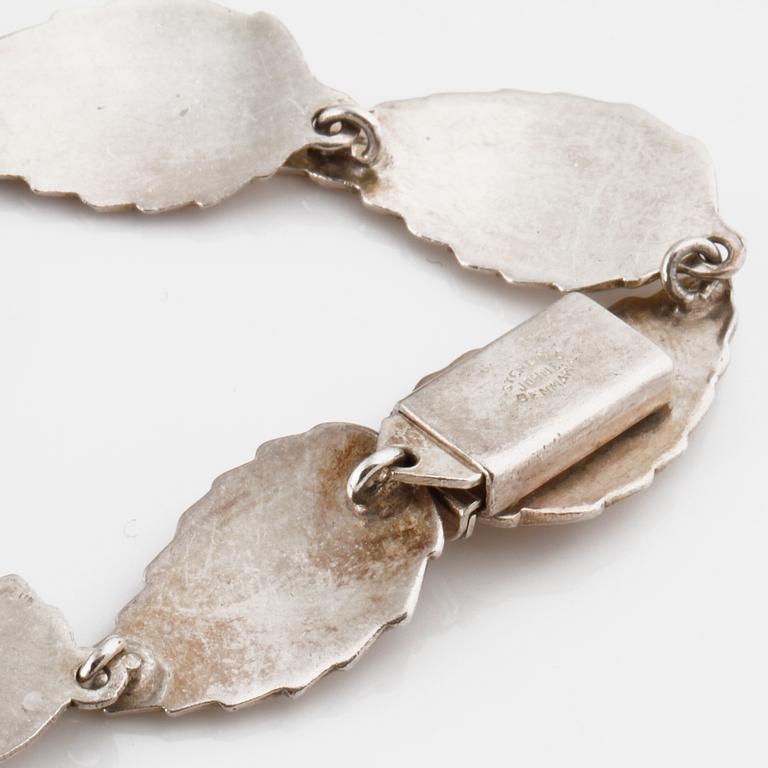 COLLIER, ARMBAND, BROSCH samt ÖRHÄNGEN, ett par, John Lauritzen och S Christian Fogh, Danmark.
