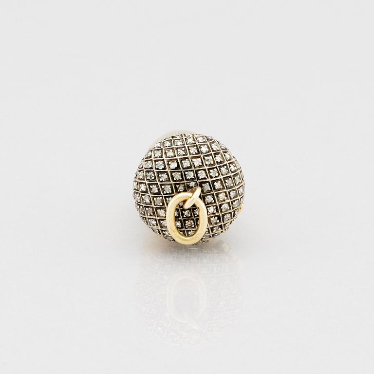 A jeweled gold pendant locker, with a cigarette holder, St. Petersburg 1908-1917.