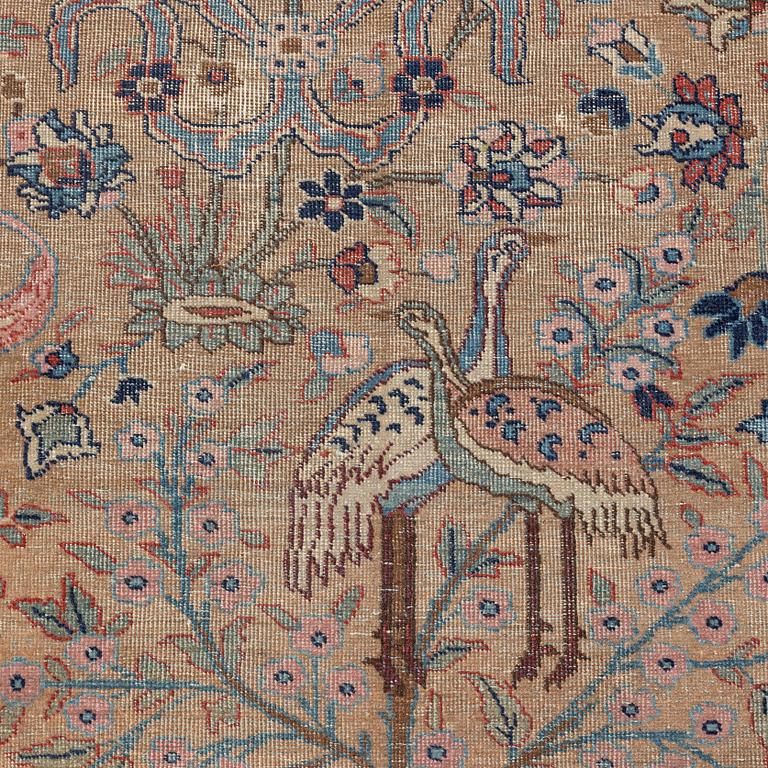 An oriental carpet, circa 350 x 295 cm.