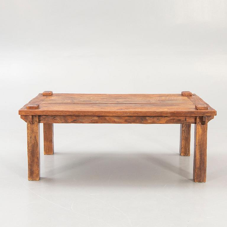 A wooden coffee table later part of the 20th century.