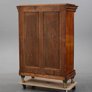 An Empire mahogany cabinet, first half of the 19th Century.