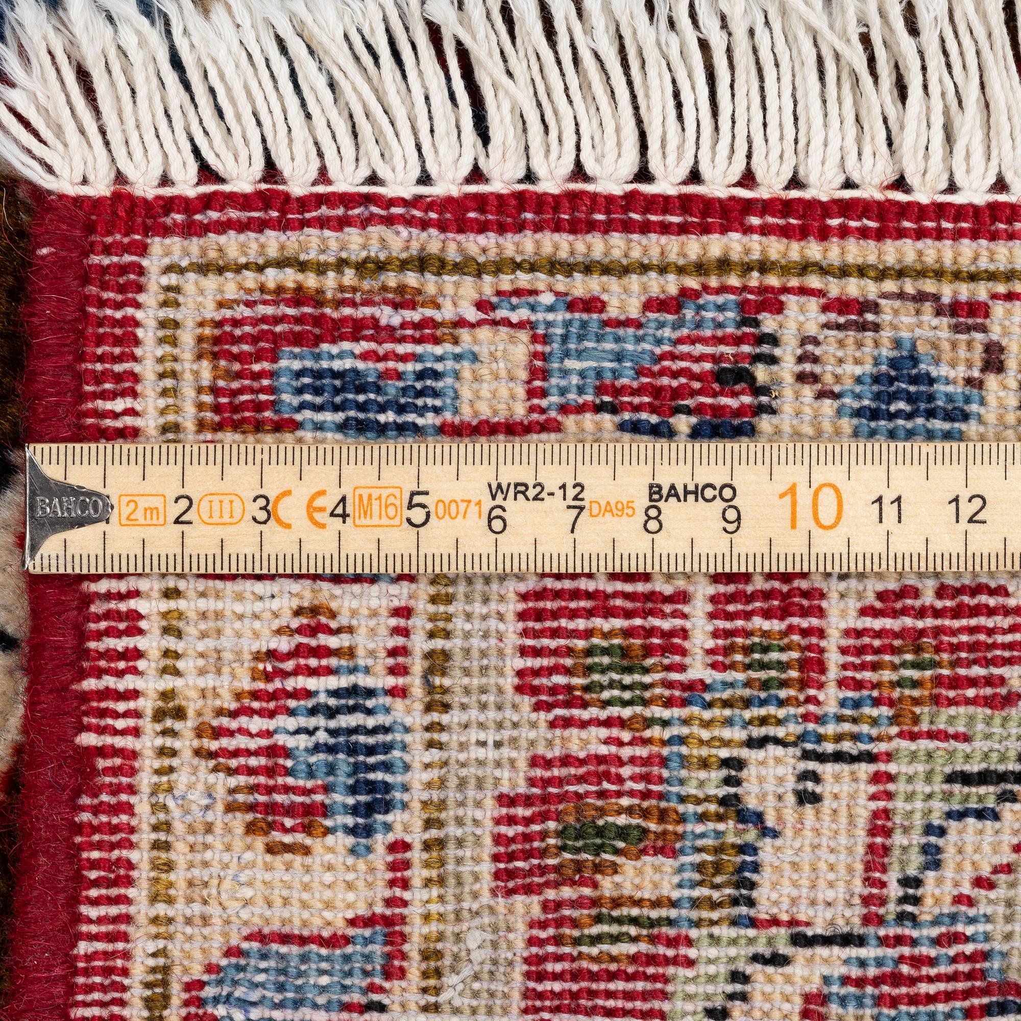 A Najafabad carpet, c. 293 x 202 cm.