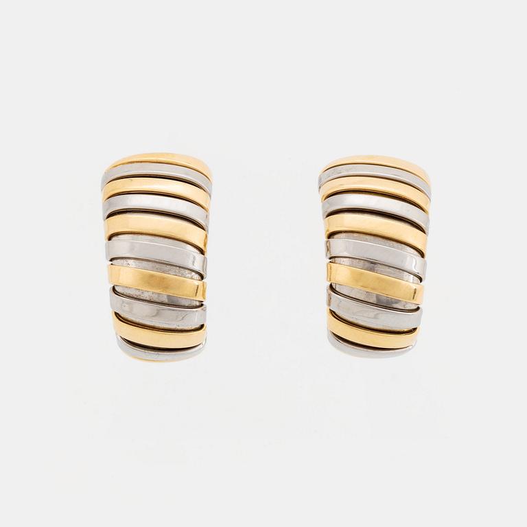A pair of Bulgari "Tubogas" earrings in 18K gold and steel.