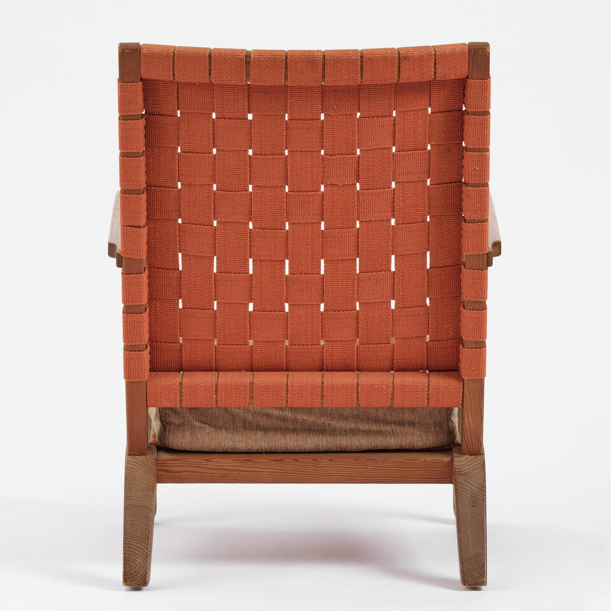Axel Einar Hjorth, a stained pine "Väddö" easy chair, Nordiska Kompaniet, Sweden, 1930s-40s.