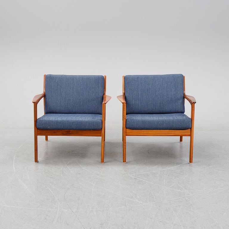 Folke Ohlsson, a pair of teak 'USA 75' easychairs, Dux, designed in 1963.
