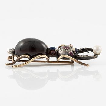 Brooch, in the form of an insect, 14K gold with garnet, diamonds, ruby, sapphire, and pearl.