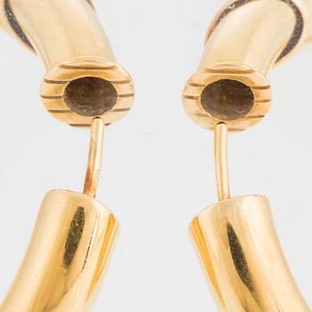 A pair of Cartier earrings.