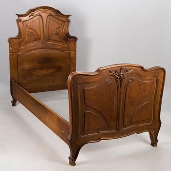 A pair of early 20th Century art nouveau style beds.