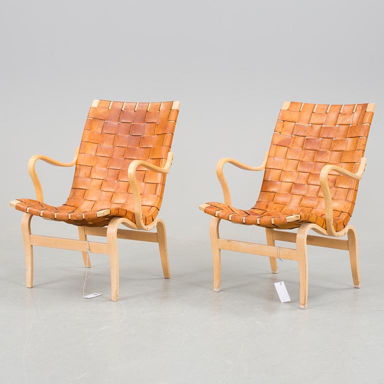 A pair of Bruno Mathsson "Eva" armchairs.