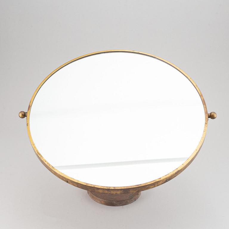 A model 2214 brass table mirror by Josef Frank for Firma Svenskt Tenn.