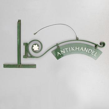 BUTIKSSKYLT, 1900-talets andra hälft.