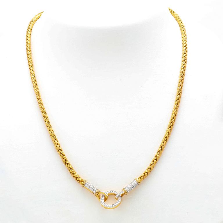 Collier 22K guld med runda briljantslipade diamanter.