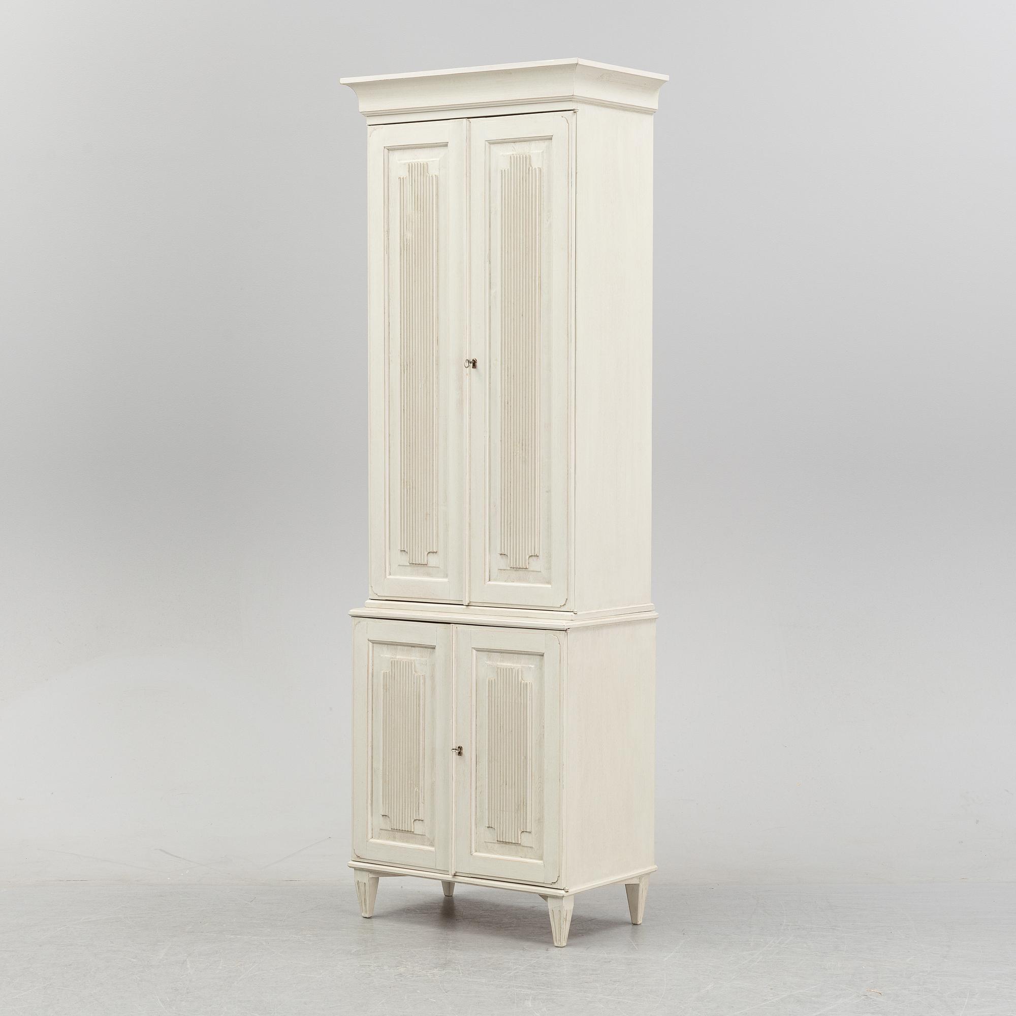 A contemporary Gustavian style cabinet.