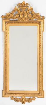 A Gustavian style mirror, around 1900.