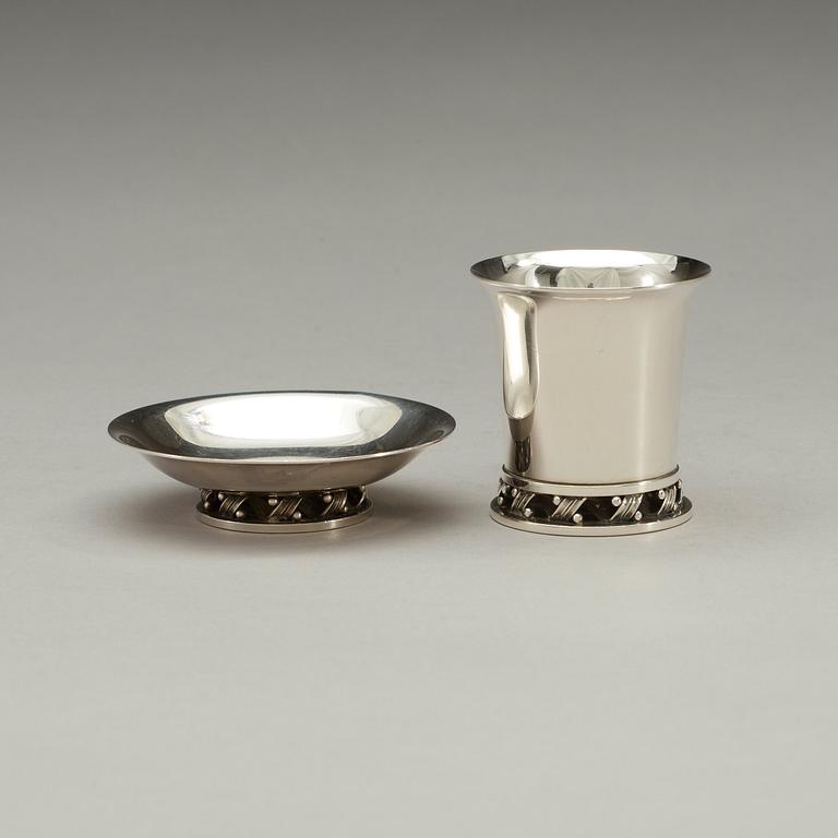 A Harald Nielsen set of 12 sterling ashtrays and cigarette jars, Georg Jensen, Copenhagen 1933-44.