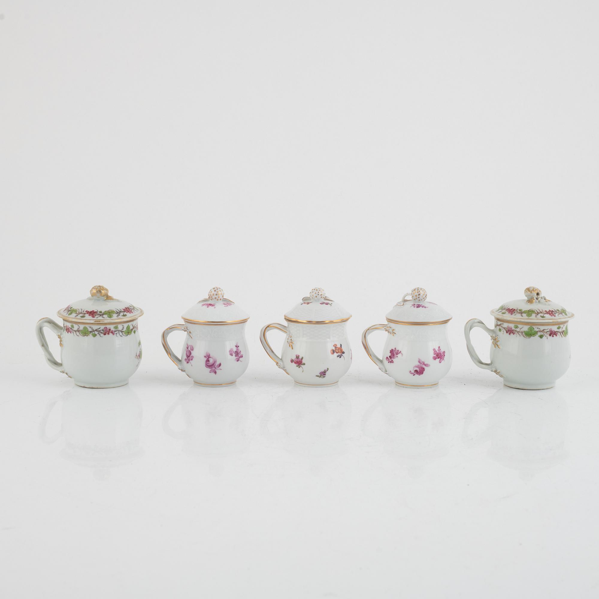 Five porcelain custard cups in various models, 19th-20th Century.