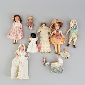 9 German porcelain dolls and 1 stroller from the 1910-/20's.