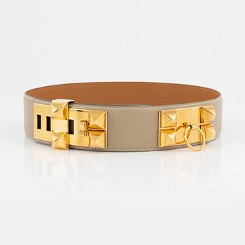 Hermès, a 'Collier de Chien' beige leather belt, 2003. Size 75.