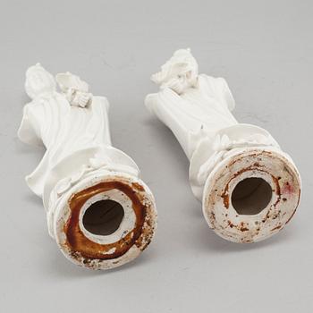 A pair of Chinese blanc de chine figurines, circa 1900.