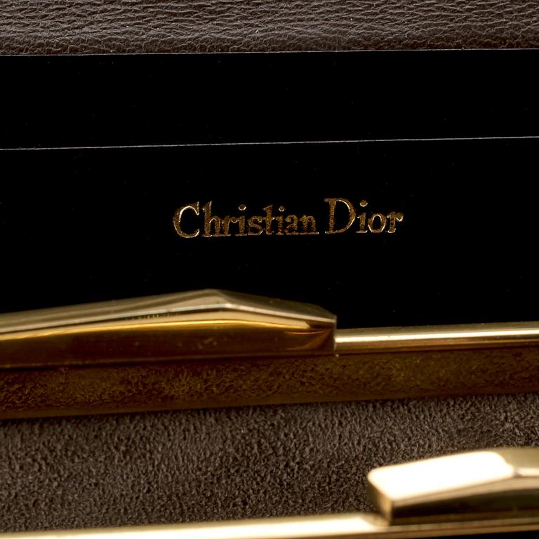 CHRISTIAN DIOR, a brown calf leather clutch / evening bag.