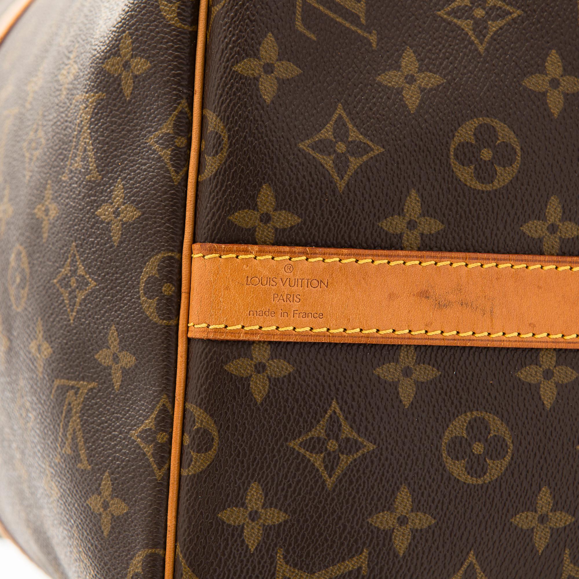 Louis Vuitton, a Monogram Canvas 'Keepall 55 Bandoulière' weekend bag.