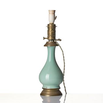 A celadon vase made into a lamp, circa 1900.