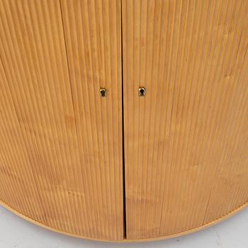 Corner cabinet, circa the mid-20th century.